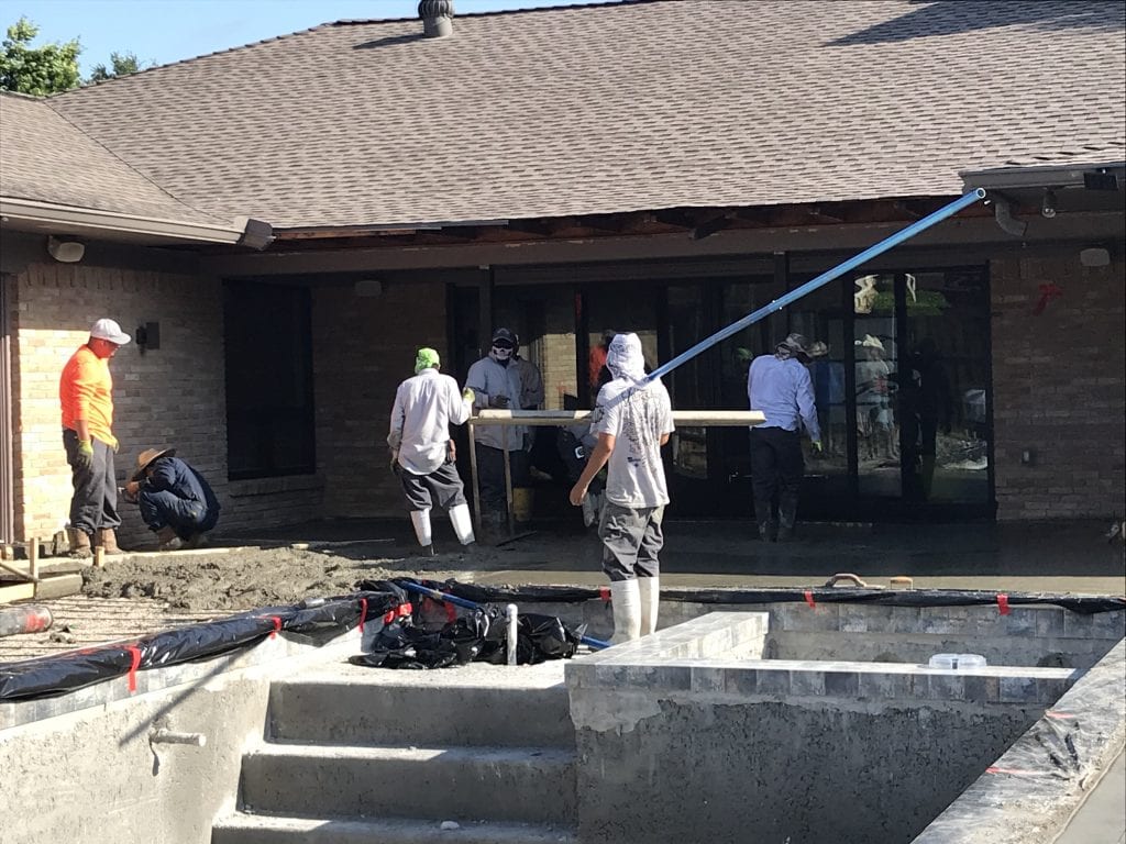 Pool builders building custom rectangular pool