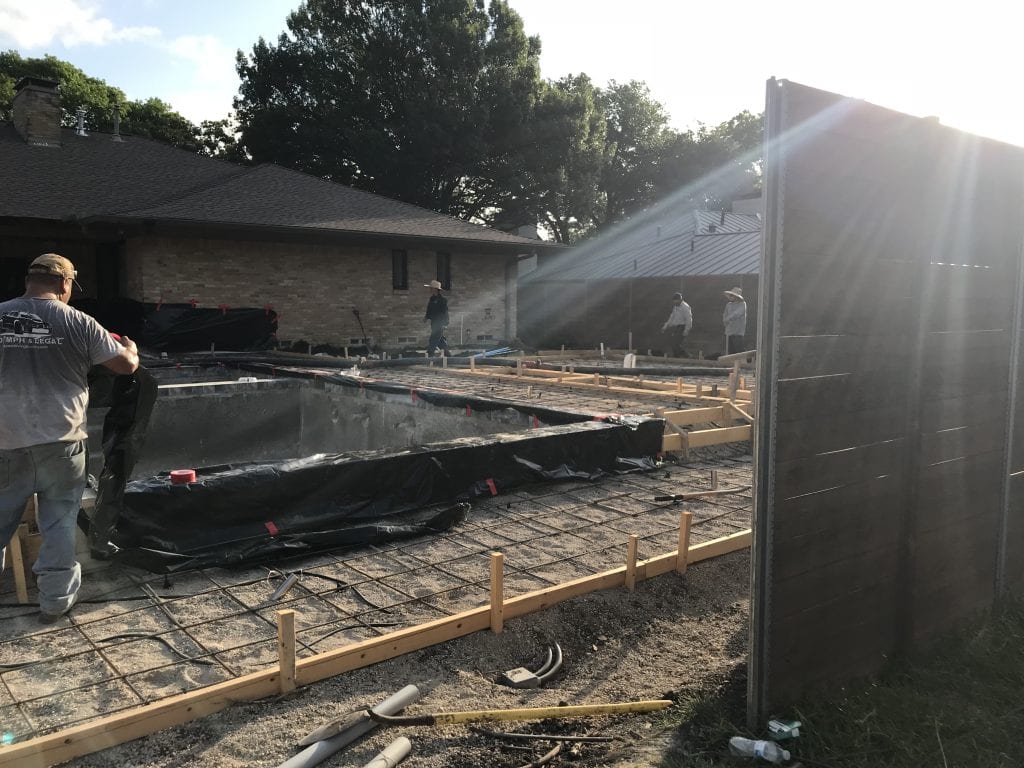 Pool builders building custom rectangular pool